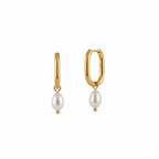 ALIÉA Saga Perle Hoops i 18K guld med hvid perle, ovale øreringe i rustfrit stål med et tidløst og elegant design.